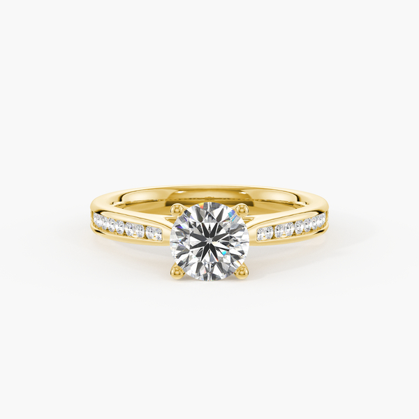 Yellow-gold round solitaire with channel-set diamond shoulders, front view, illustrative 18K Yellow Gold preview