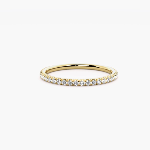 Slender yellow-gold band with a fine row of round diamonds, front view, illustrative 18K Yellow Gold preview